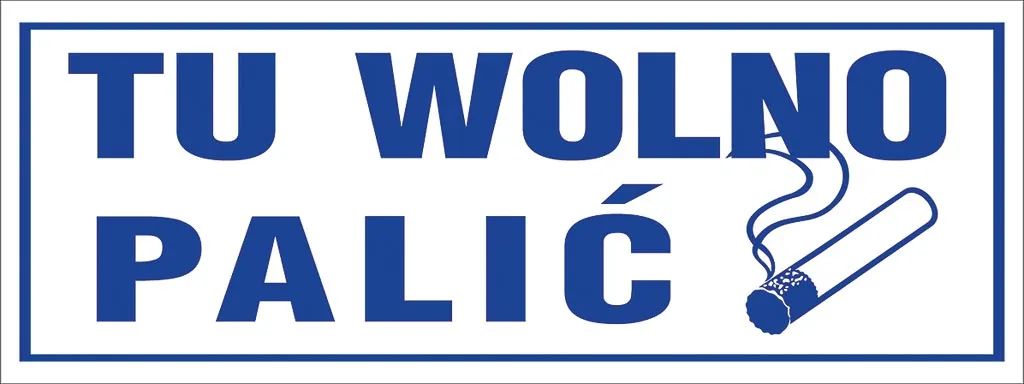 Znak bezpieczeństwa o wymiarach 253x94 pikseli, z napisem „TU WOLNO PALIĆ” w otoczeniu granatowej ramki. Zawiera grafikę palącego papierosa. Wykonany głównie w kolorach niebieskim i białym.