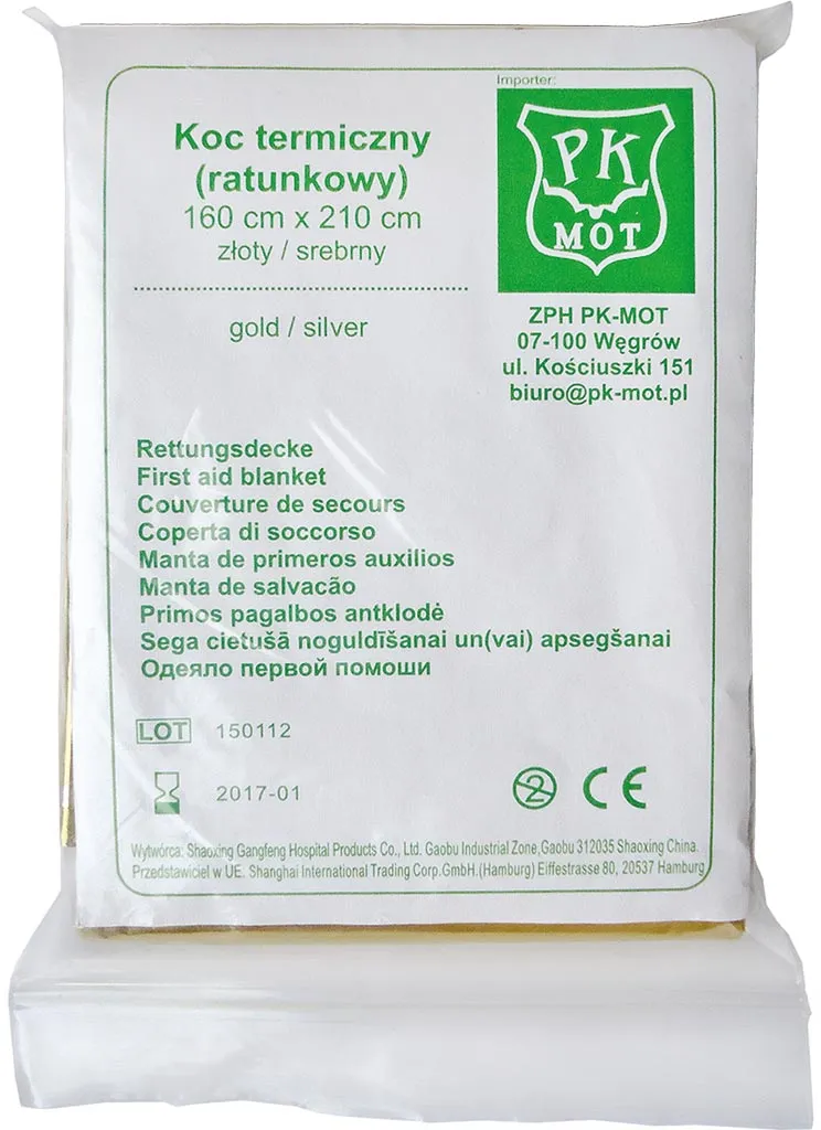 Koc termiczny (ratunkowy) o wymiarach 160 cm x 210 cm, srebrny, wielojęzyczny opis produktu. Opakowanie białe z zielonymi akcentami i symbolami CE.