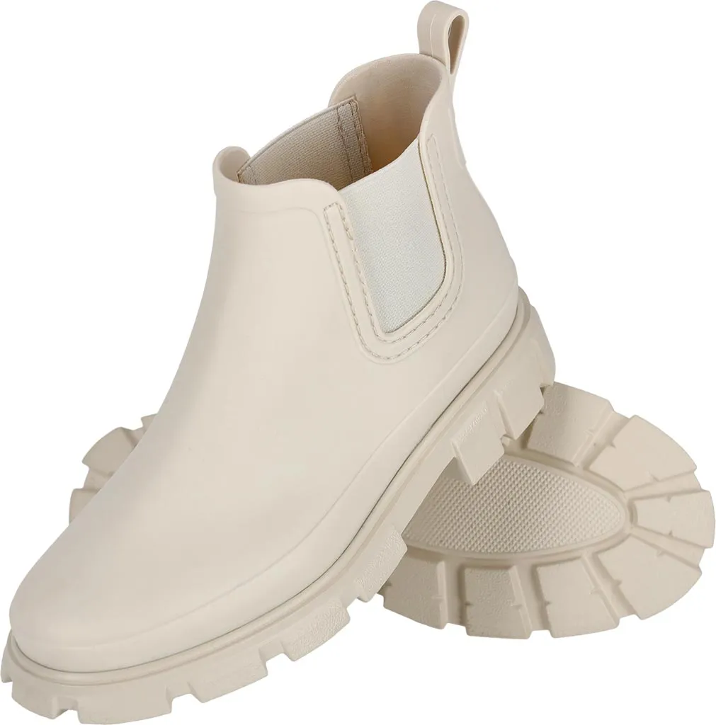 Buty krótkie, damskie z PVC, w kolorze jasnobrązowym. Posiadają elastyczną wkładkę na boku i grubą, żłobioną podeszwę.
