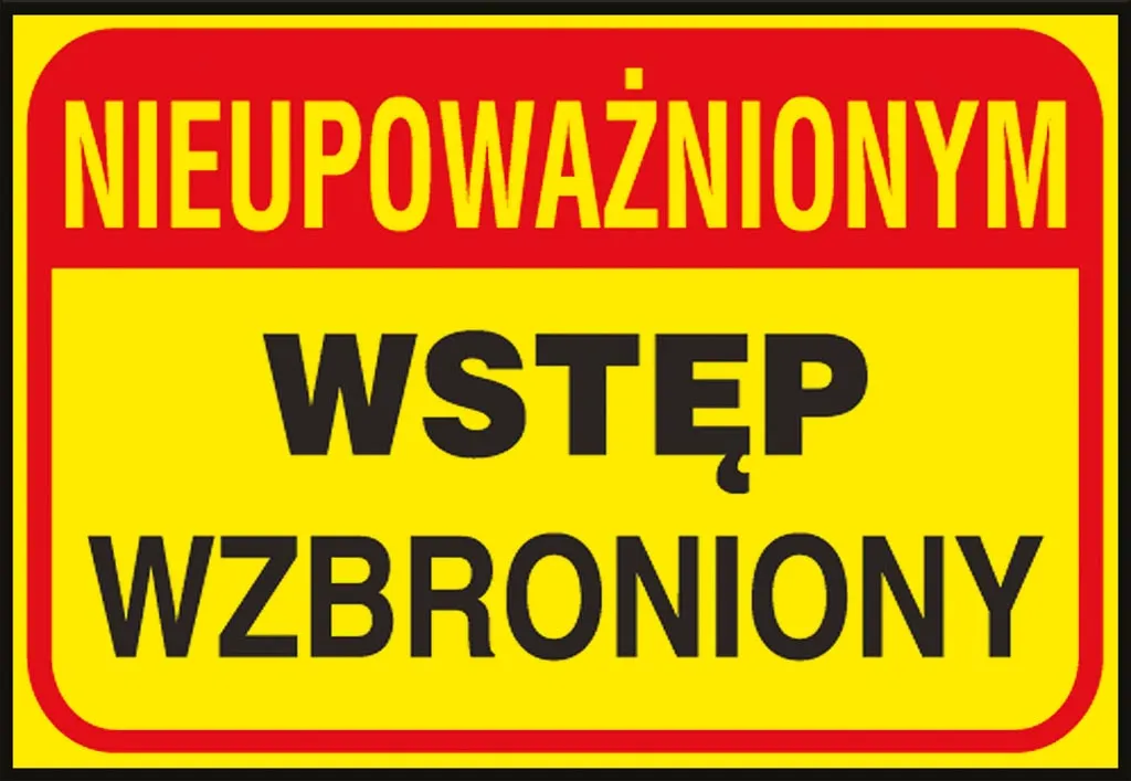 Tablica ostrzegawcza o żółtym tle z czarnymi i czerwonymi napisami, informująca