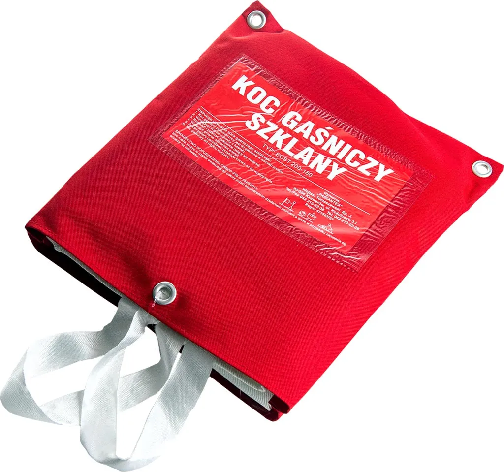 Czerwony koc gaśniczy z białymi paskami u dołu, zapakowany w czerwoną osłonkę z napisem 