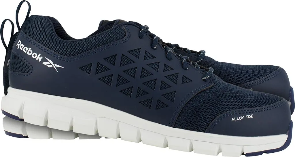 Ciemnoniebieskie półbuty bezpieczne, marki Reebok. Model posiada białą, elastyczną podeszwę oraz wzory w formie trójkątów na boku. Na języku widoczne oznaczenie