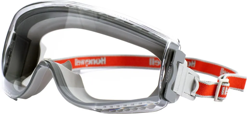 Gogle ochronne Honeywell MAXX PRO z przeźroczystymi soczewkami i regulowanym elastycznym paskiem w kolorze czerwonym z logo producenta.