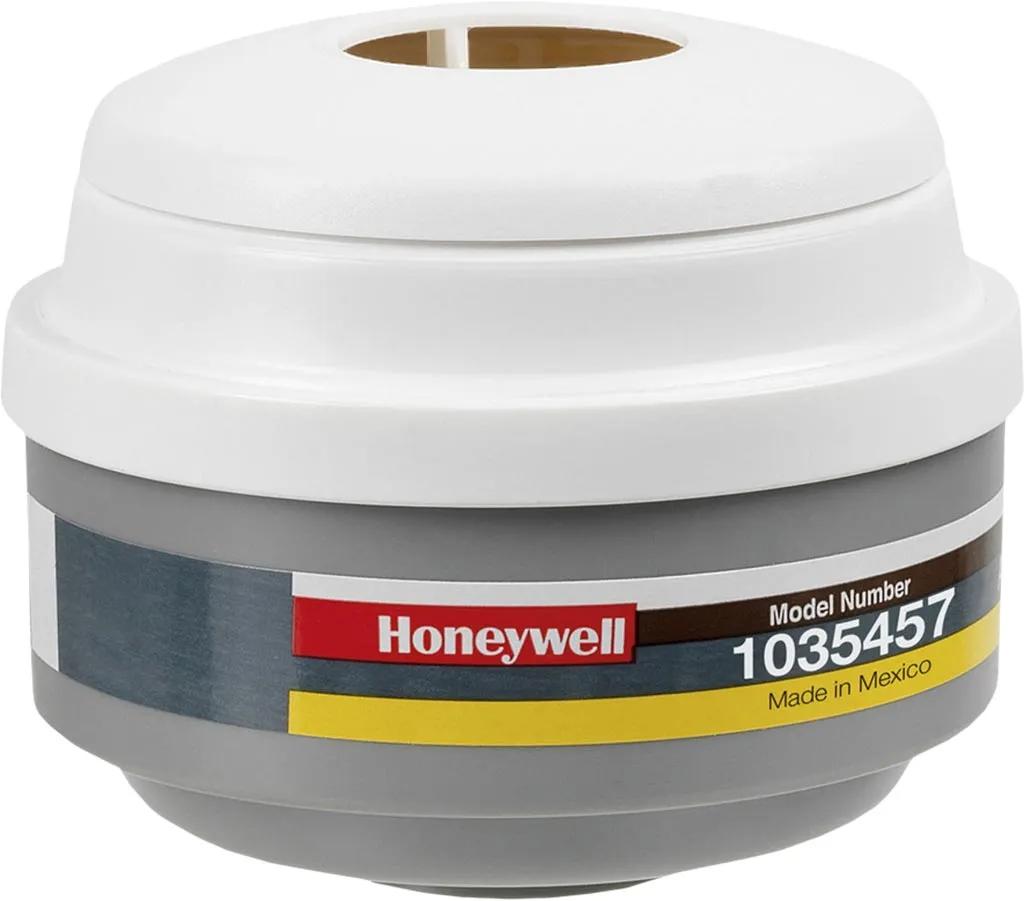 Filtropochłaniacz Honeywell, model 1035457. Biało-szary korpus z paskami kolorowymi i otworem na górze. Made in Mexico.