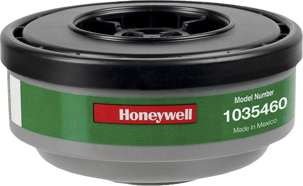 Pochłaniacz K1 marki Honeywell, model numer 1035460, wykonany w Meksyku. Czarne i zielone wykończenie, okrągły kształt.