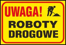 Tablica ostrzegawcza o żółtym tle z napisem „UWAGA! ROBOTY DROGOWE” oraz czarnym piktogramem przedstawiającym postać pracującą przy kopaniu.