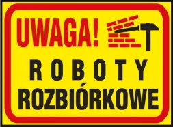 Tablica ostrzegawcza jest żółta z czerwoną ramką. Na górze napis 