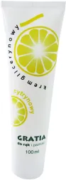 Biała tubka kremu do rąk i paznokci marki GRATIA o pojemności 100 ml z grafiką żółtego cytrynowego plasterka.