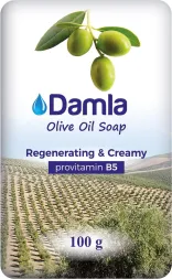 Mydło Damla Olive Oil Soap, regenerujące i kremowe z prowitaminą B5. Waga 100 g. Opakowanie z grafiką oliwek i pola oliwnego.