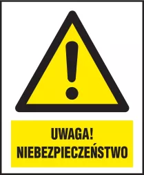Znak ostrzegawczy o kształcie trójkąta z żółtym tłem i czarną ramką. Wewnątrz czarny wykrzyknik. Pod spodem żółty prostokąt z napisem 