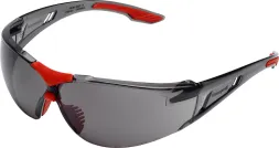 Okulary ochronne Honeywell SVP 400 posiadają przyciemniane soczewki i są wyposażone w regulowane zauszniki. Części zauszników w kolorze czerwonym dodają estetycznego akcentu.
