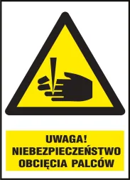 Znak bezpieczeństwa w kształcie trójkąta z żółtym tłem i czarnym obramowaniem. Wewnątrz grafika przedstawiająca dłoń i ostrze, nad którym umieszczony jest tekst „UWAGA! NIEBEZPIECZEŃSTWO OBCIĘCIA PALCÓW”.